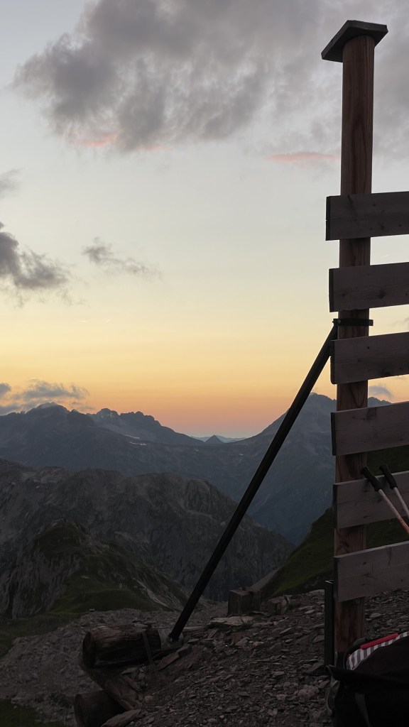 Sunset towards the hut from the rocky ridge with the Madloch lift station
