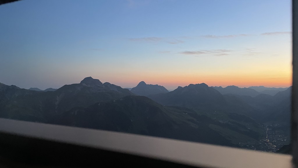 the sunrise through the window from inside the Biwak hut